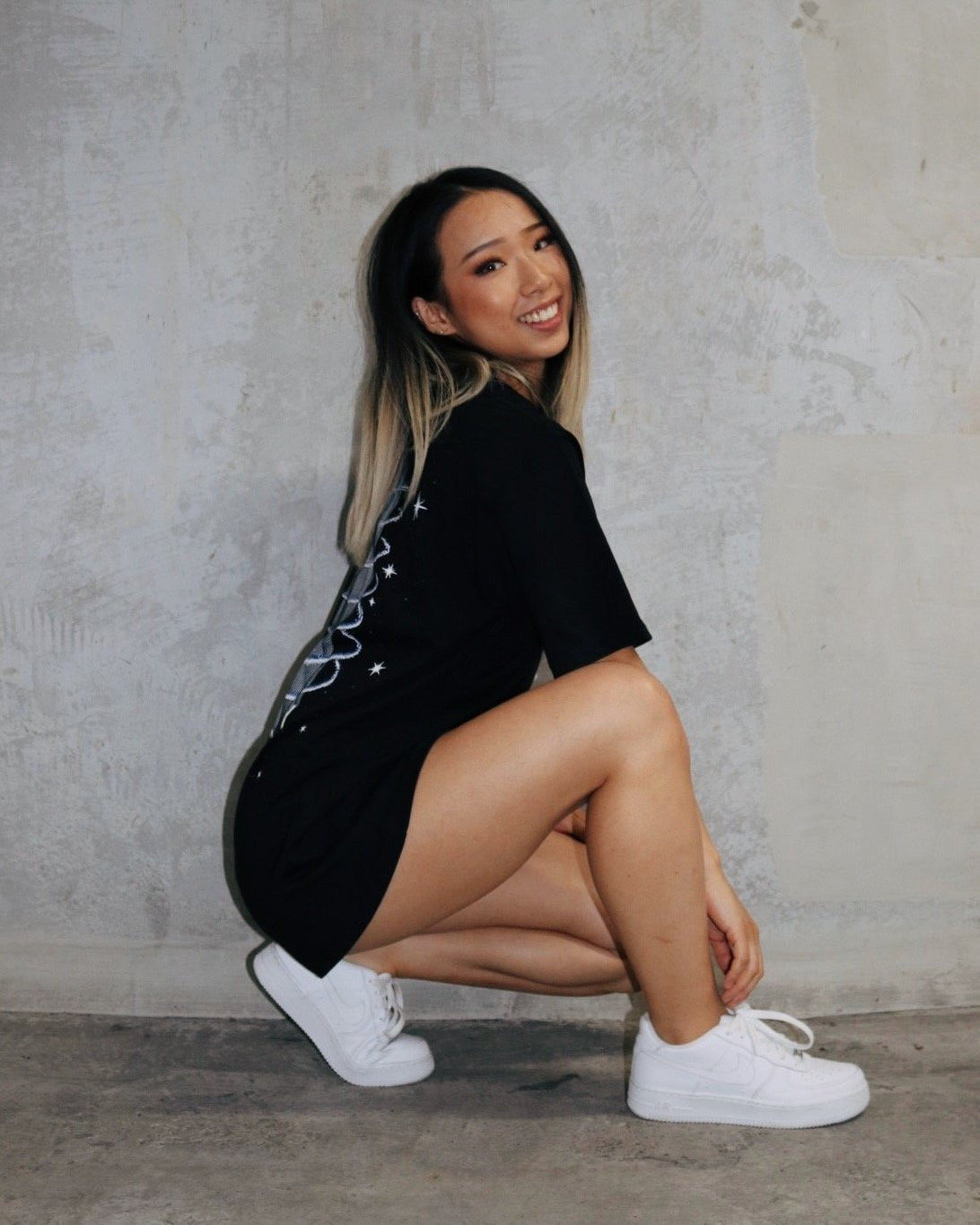 BY FALLING WE LEARN TEE - BLACK.